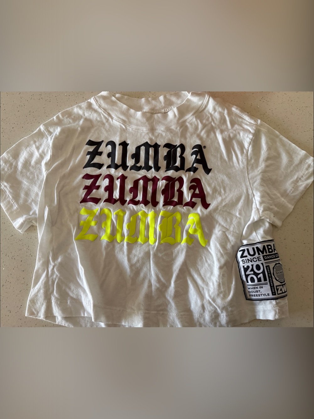 Zumba Fitness Kids White Tee with Yellow, Red & Black Logo